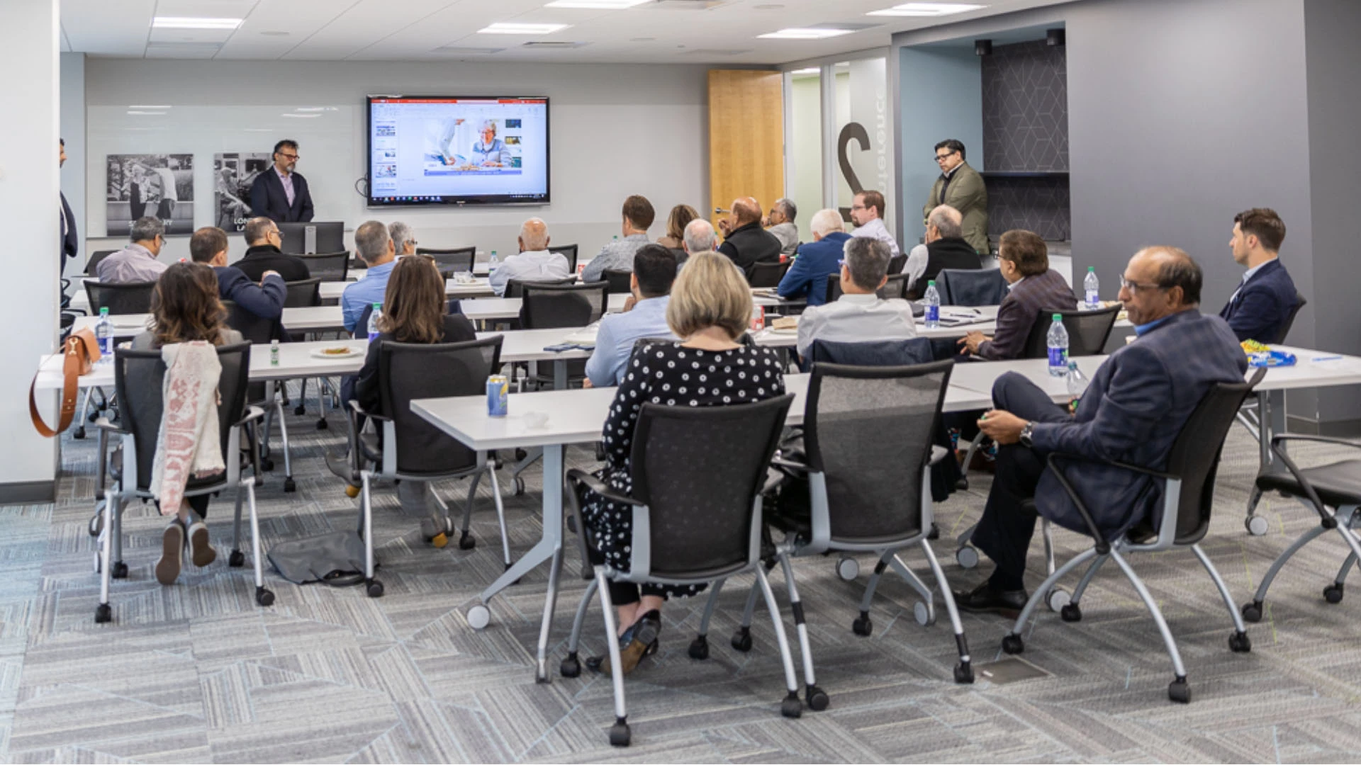 Employees watching a presentation